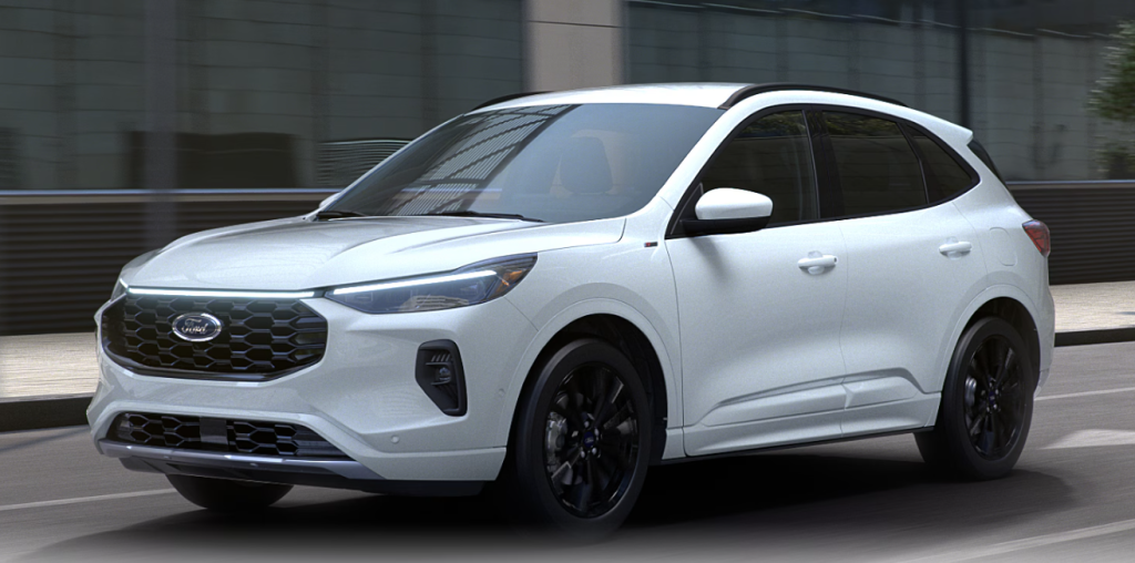 White 2025 Ford Escape driving on the road