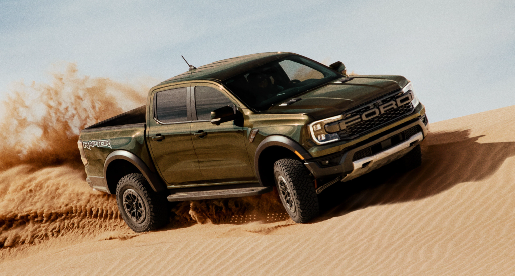 Green 2025 Ford Ranger Raptor Driving off-road